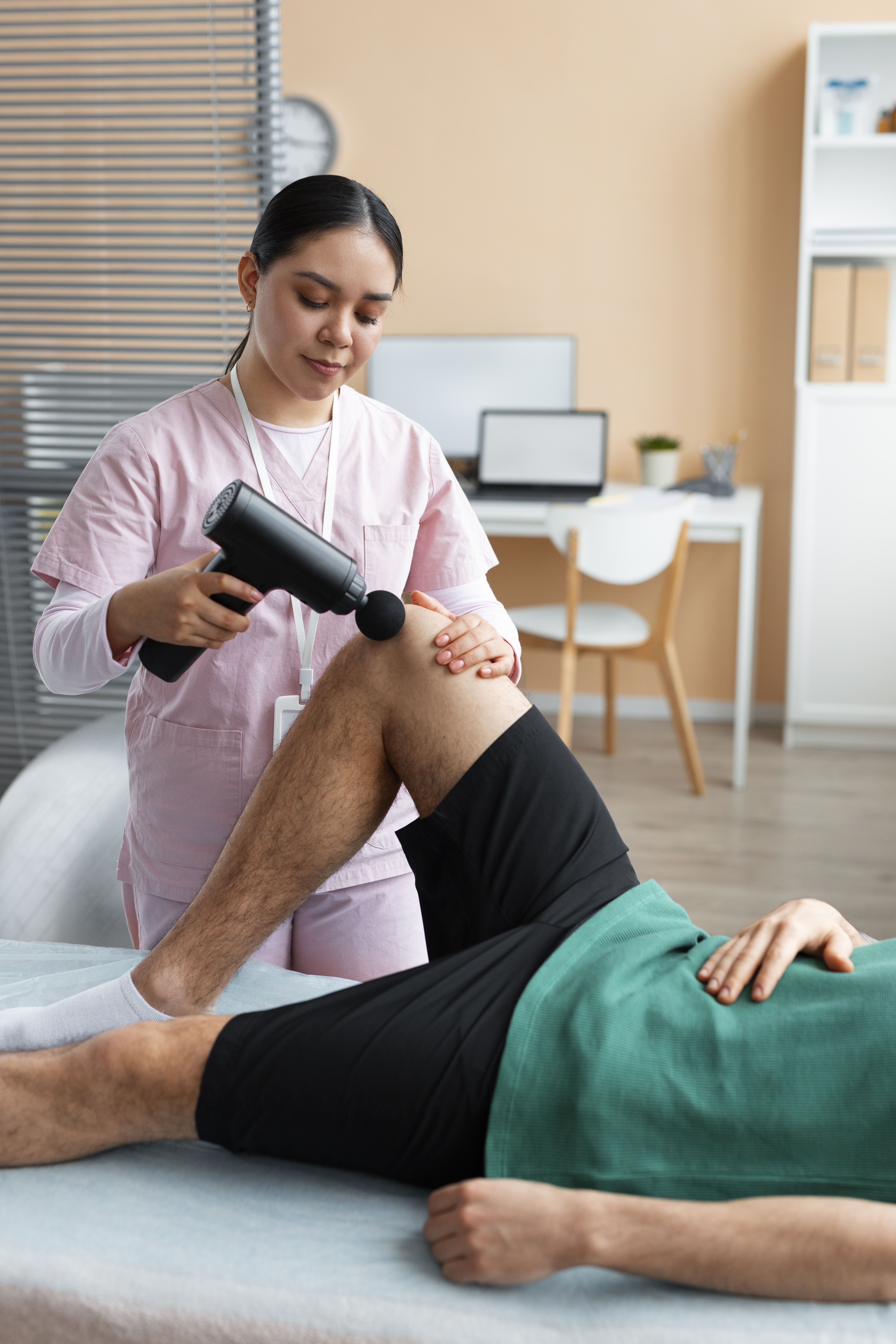 doctor-helping-patient-rehabilitation-2